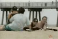 Andy raggar på stranden